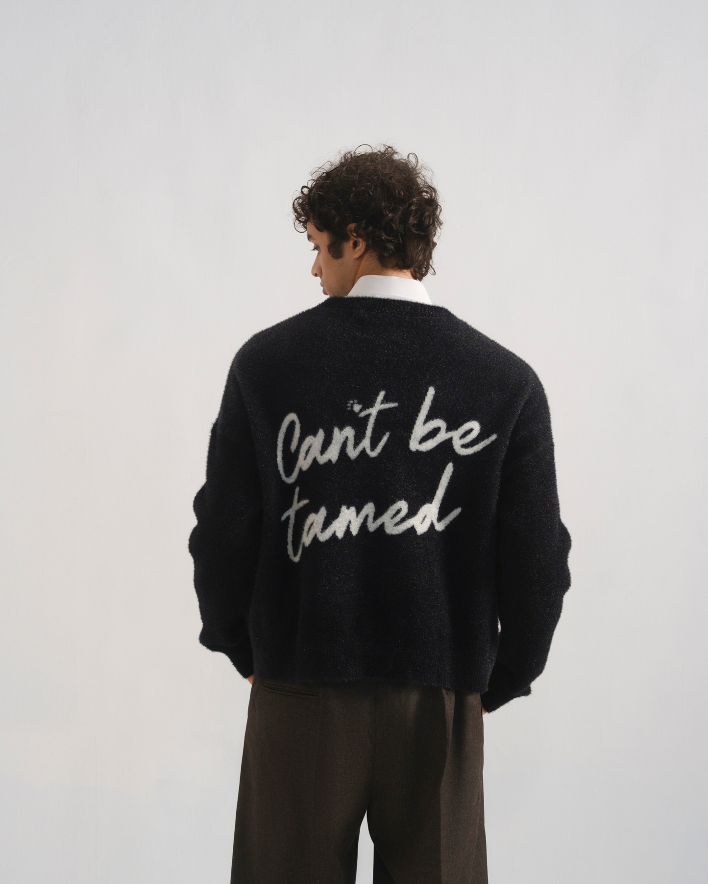 UNTAMED KNIT SWEATER